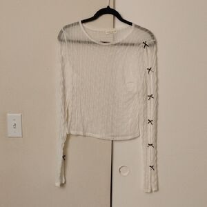 Chic White Long Sleeve Top with Black Accents